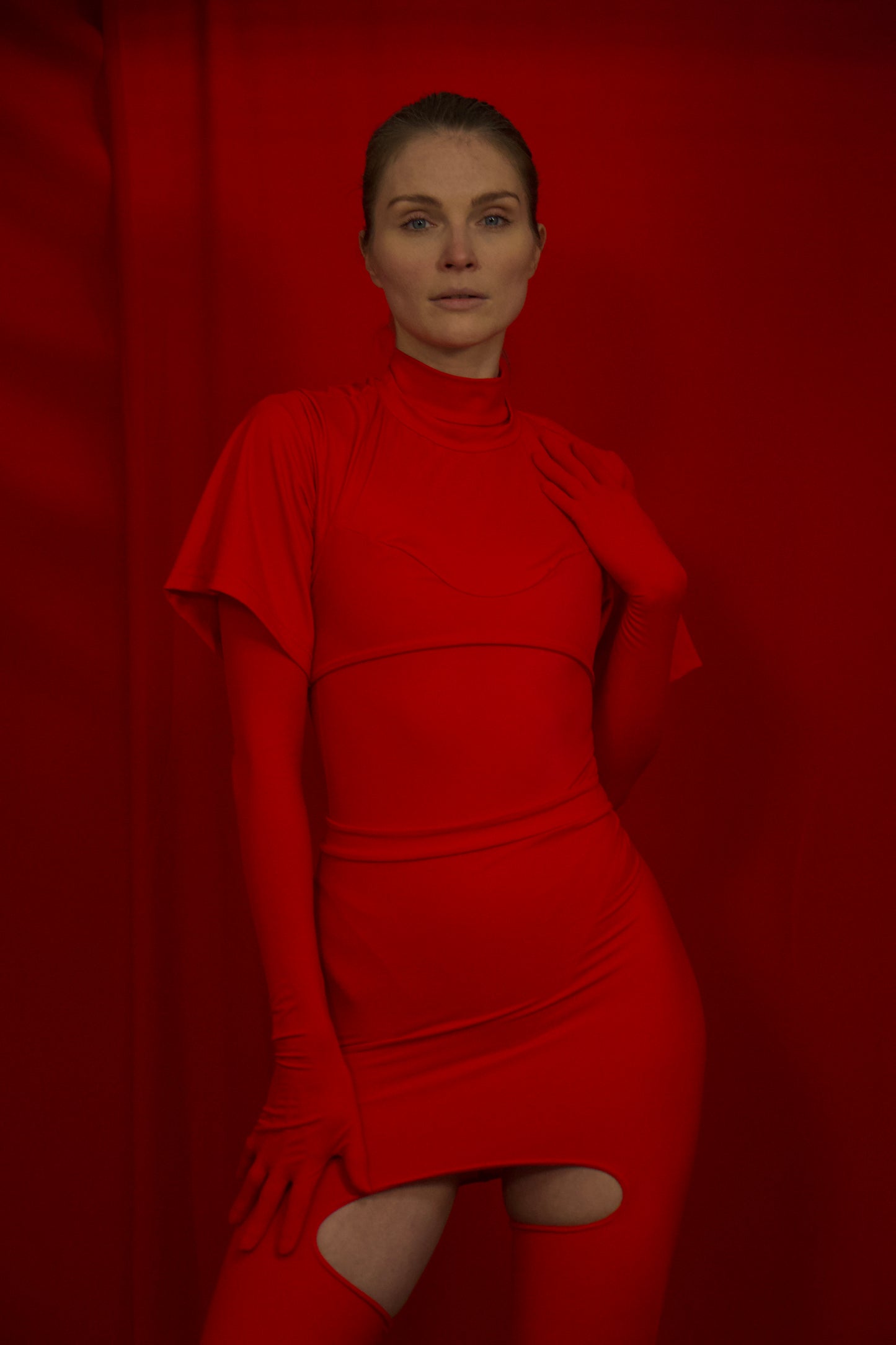Red Medusa crop top in ECONYL® technical jersey, worn on model.