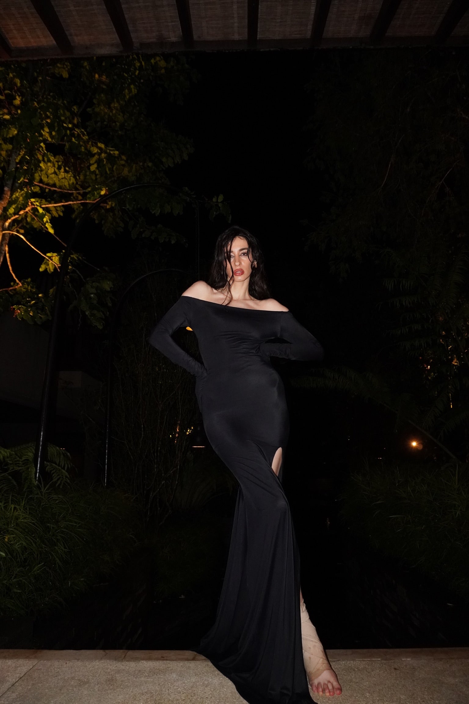 Black Hydra gown in ECONYL® technical jersey, worn on model.