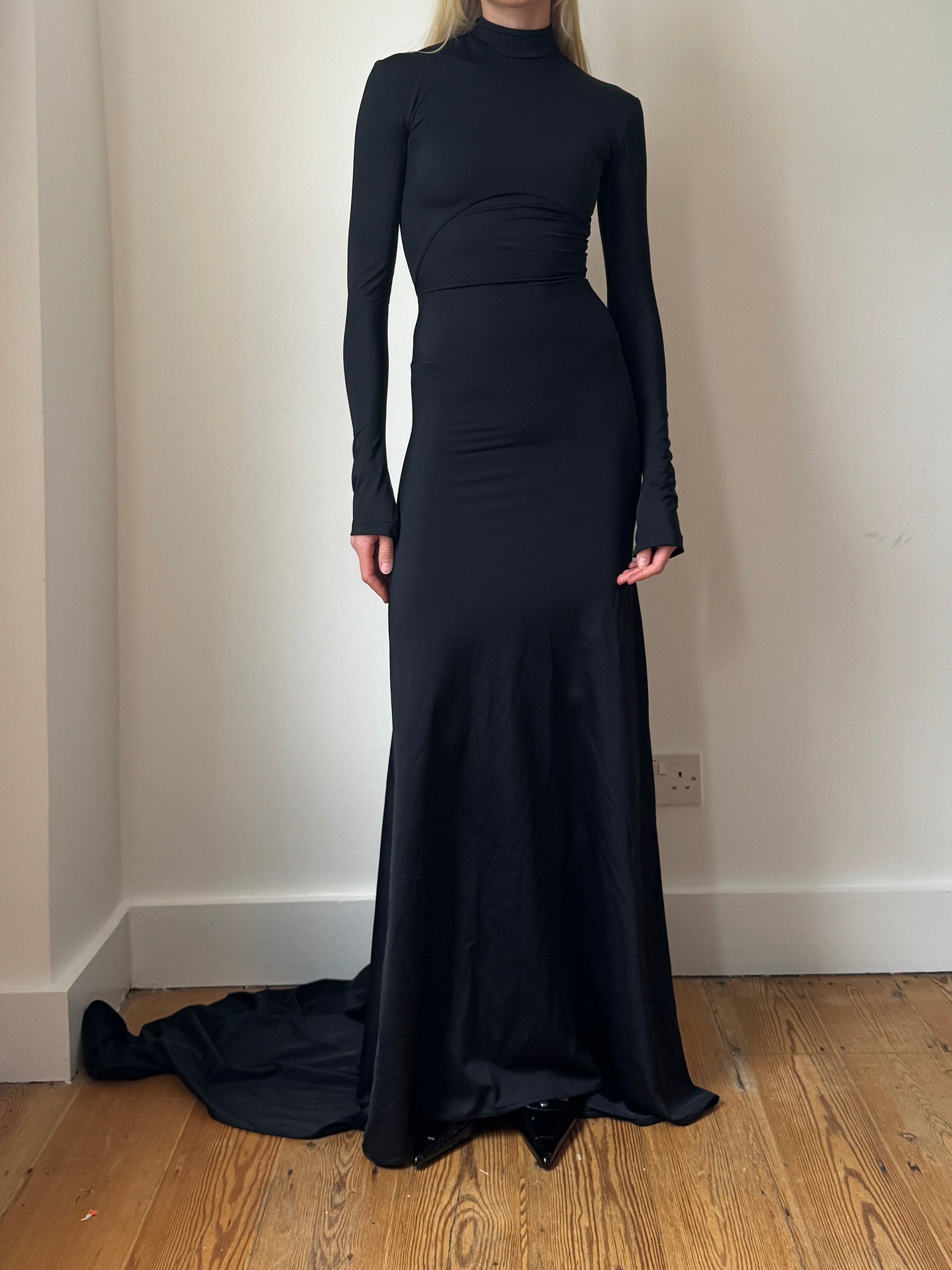 Black Manta high-neck gown in ECONYL® technical jersey, worn on model.
