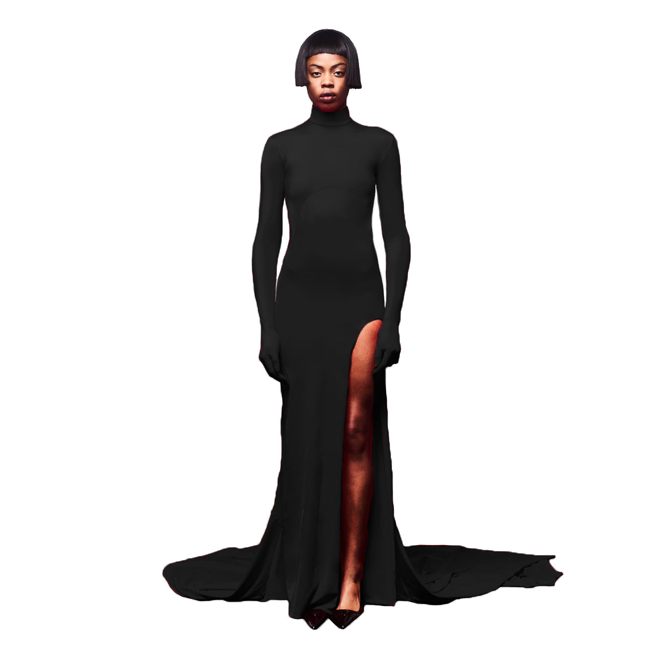 Woman wearing a black long-sleeve gown with a high slit on a white background